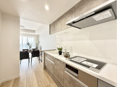 Lb` ƑƂȂAR~jP[V̏